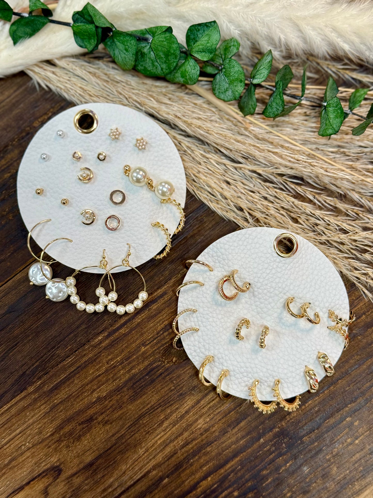 Set of 9 Stud and Hoop Sets on a Leather Circle Display, Best Seller!