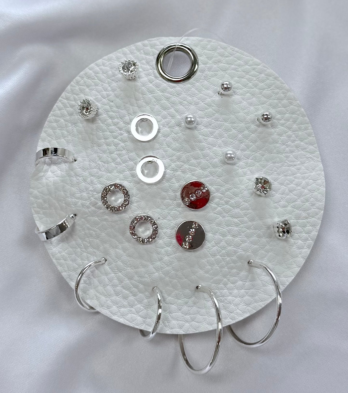 Set of 10 Silver Geometric Stud and Hoop Sets on a Leather Circle Display, Best Seller!
