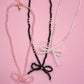 GLASS CRYSTAL BEADED BOW NECKLACE