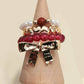 LAYERED MULTI BEADED FLORAL BOW STACKABLE RING SET | 80R053