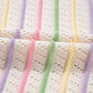The Lila Oatmeal Colorful Striped Eyelet Knit Ruffled Sleeve Sweater T Shirt