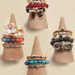 LAYERED MULTI BEADED FLORAL BOW STACKABLE RING SET | 80R053